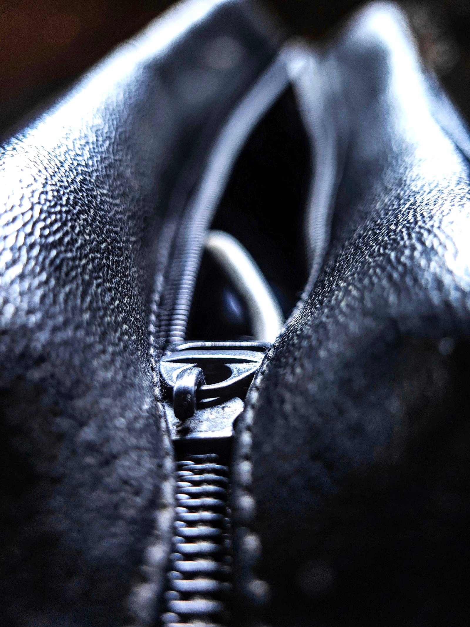 Metal zipper puller close-up